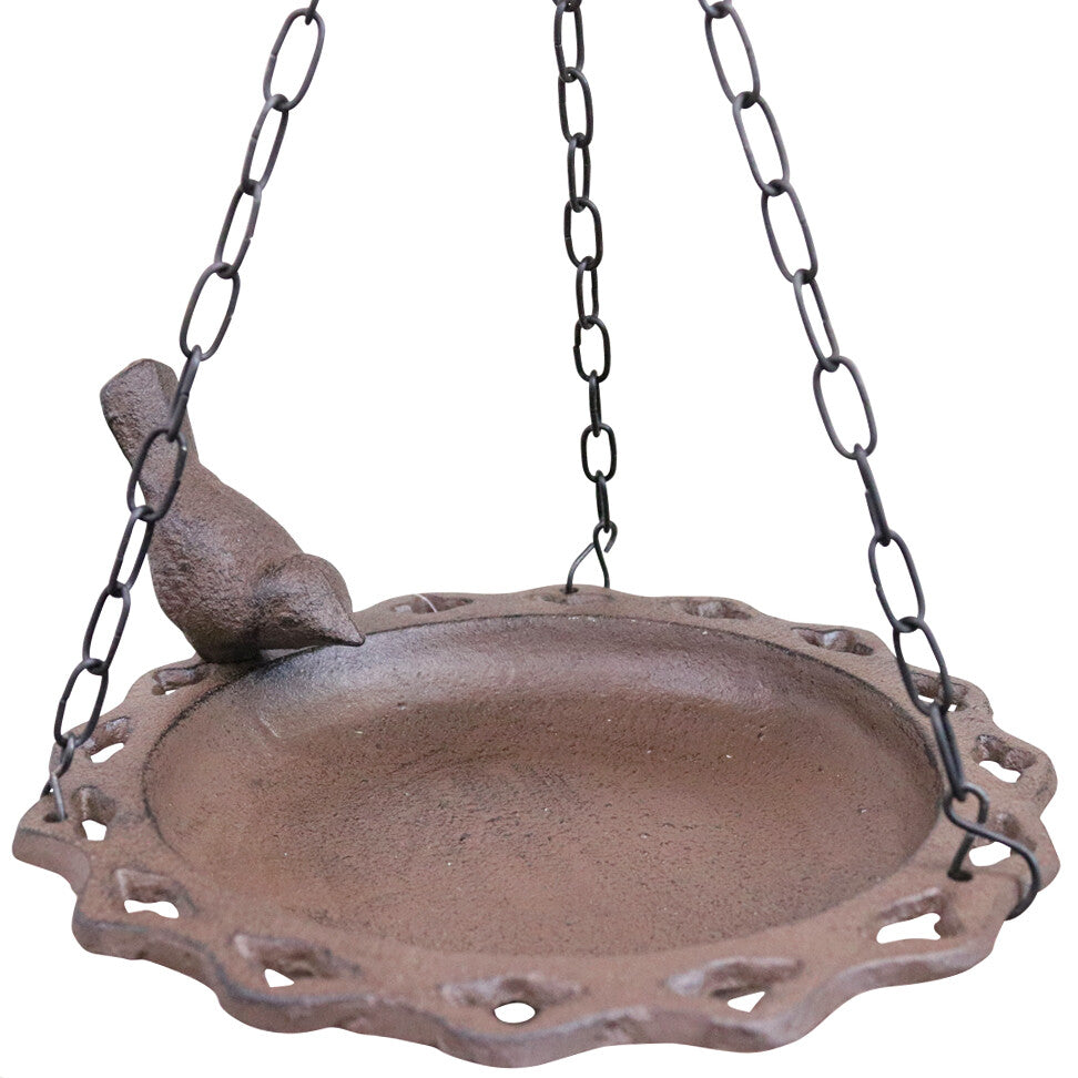 Hanging cast iron bird feeder with scalloped dish and perched bird