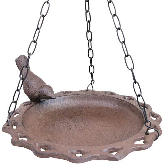 Hanging cast iron bird feeder with scalloped dish and perched bird