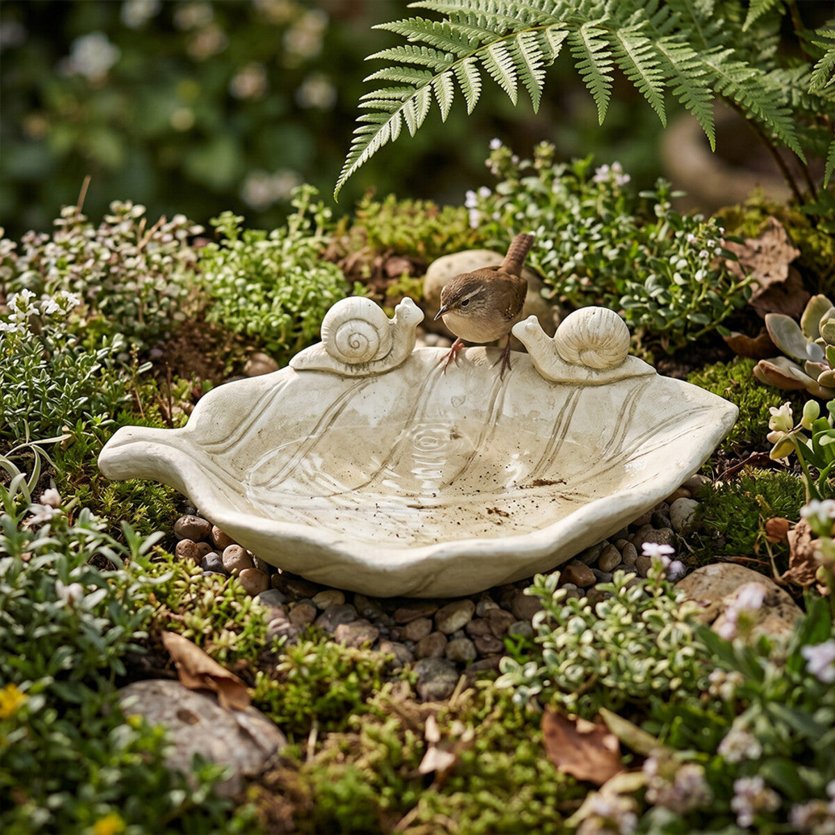 Snail water bowl leaf motif detail