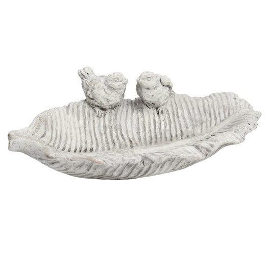 Cement leaf-shaped bird bath with two sculpted birds