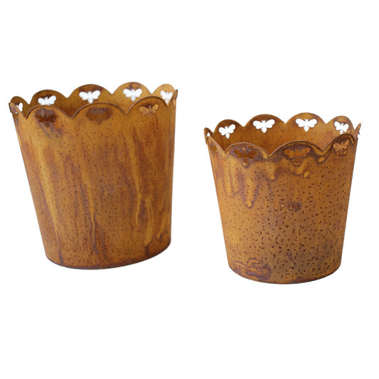 Set of two rust metal planters with scalloped edges and cut-out bees