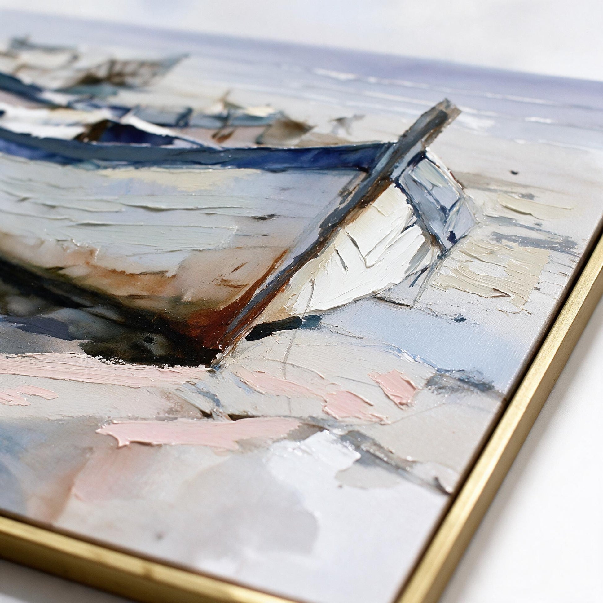 Close-up detail of textured hand-applied brushstrokes and slim gold frame edge on the Lumara Ashore framed canvas