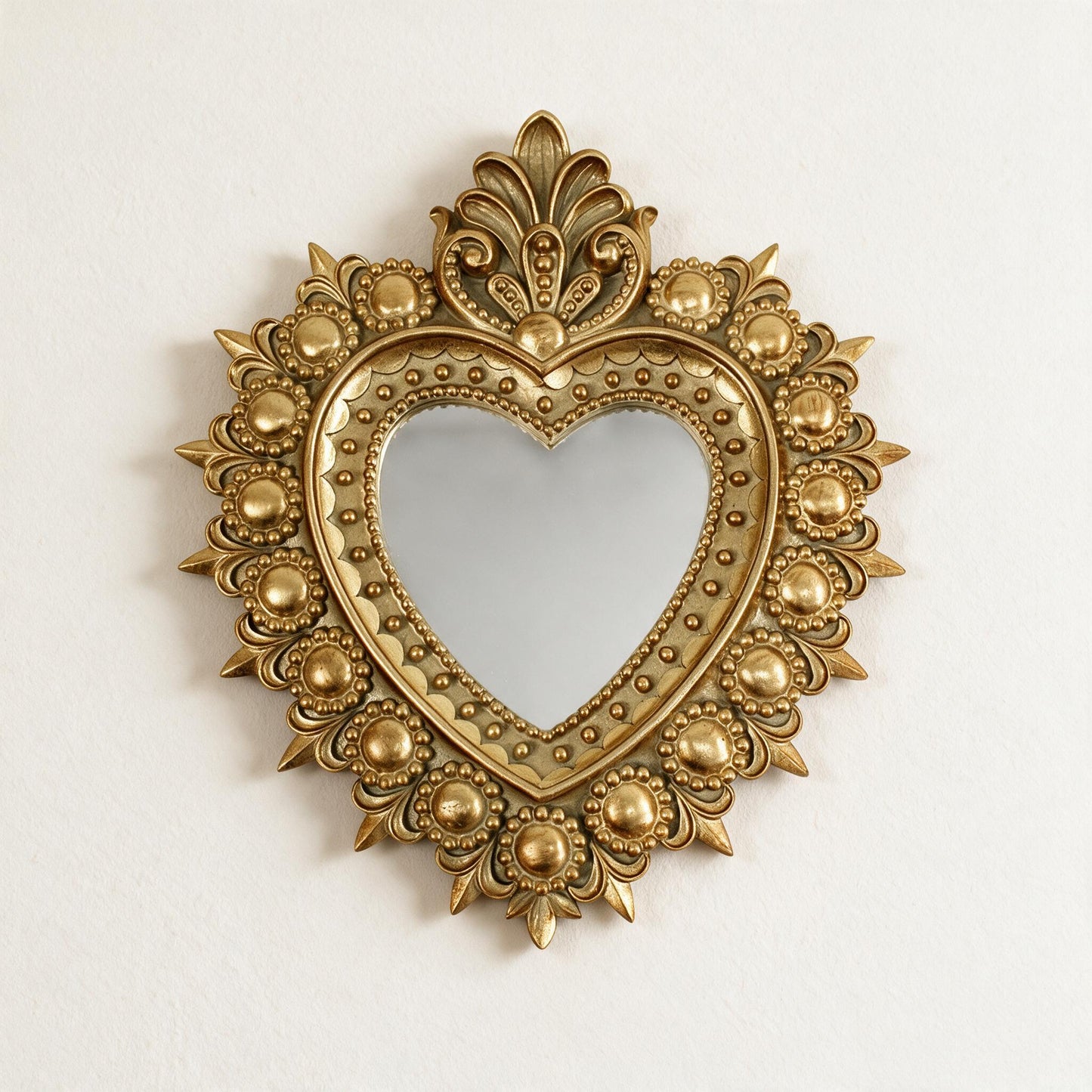 Lumara Baroque Heart Wall Art in gold with convex mirror centre, front view on warm white studio wall