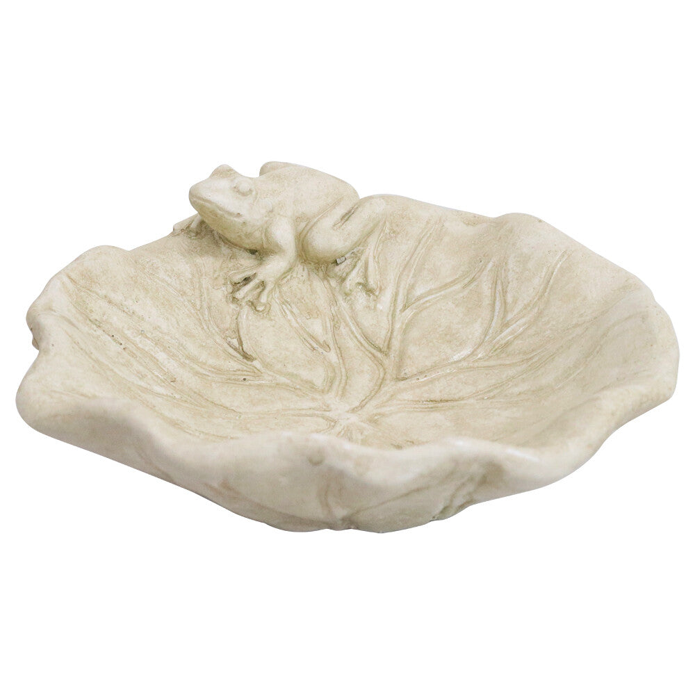 Cement lily leaf water bowl with small frog perched on the rim