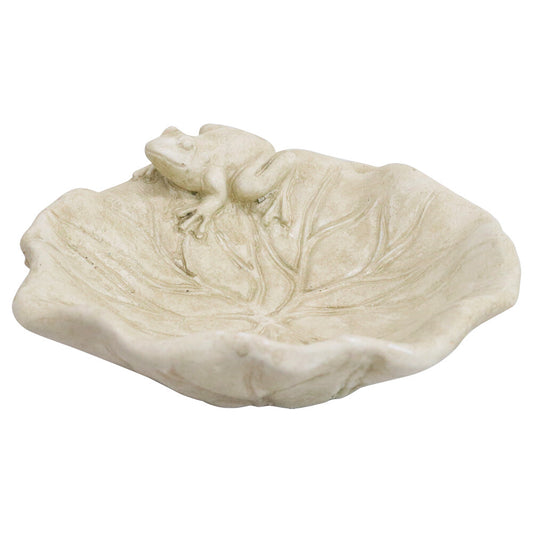 Cement lily leaf water bowl with small frog perched on the rim