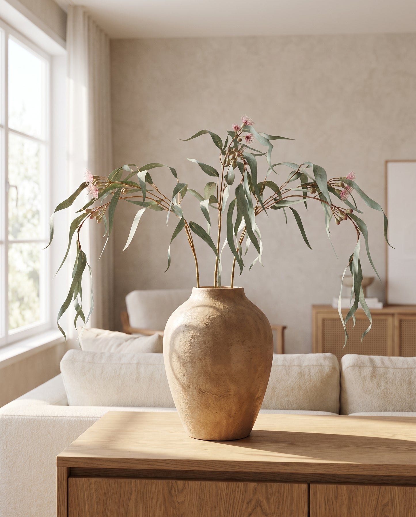 Gum Leaf Stems styled in ceramic vase in living room — Lumara Home