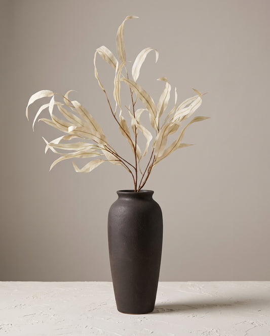 Ivory Gum Stem in tall dark floor vase — Lumara Home