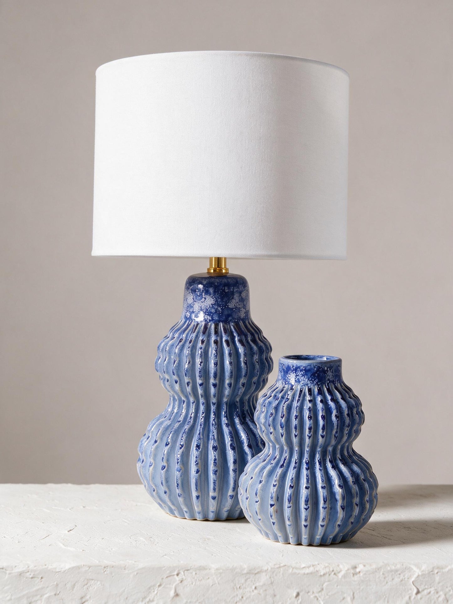Malabar Duo — ocean blue table lamp and cobalt vase styled together on plaster surface — Lumara Home