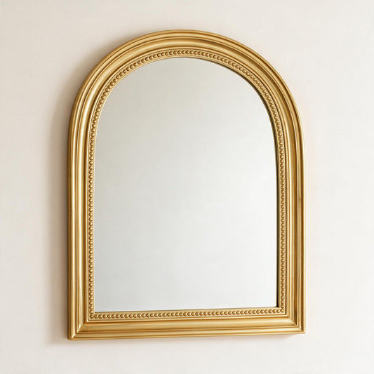 Lumara Marbella Arch Mirror in gold, front view on warm white studio wall
