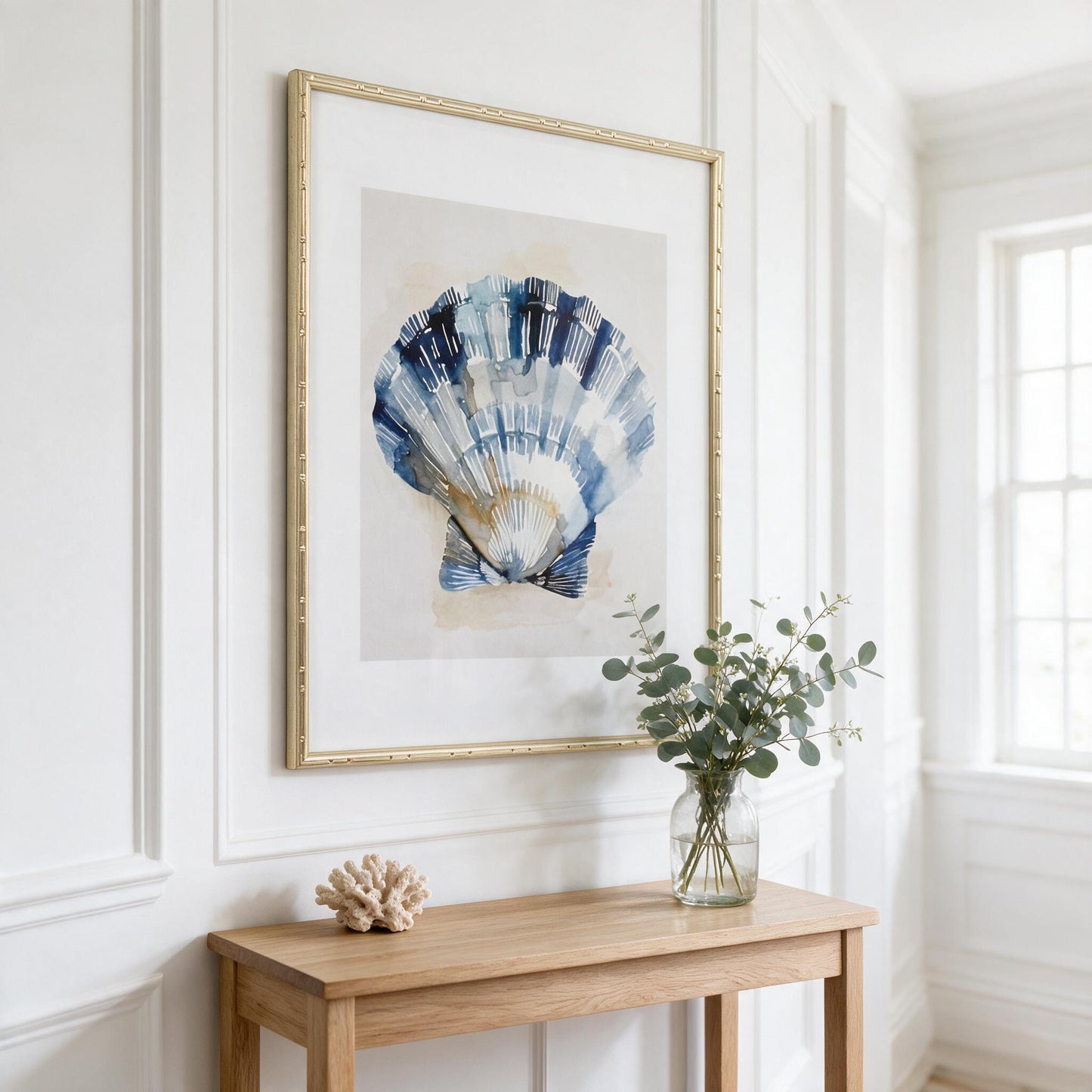 Lumara Navy Shell Framed Print II hung in a bright coastal Hamptons style hallway