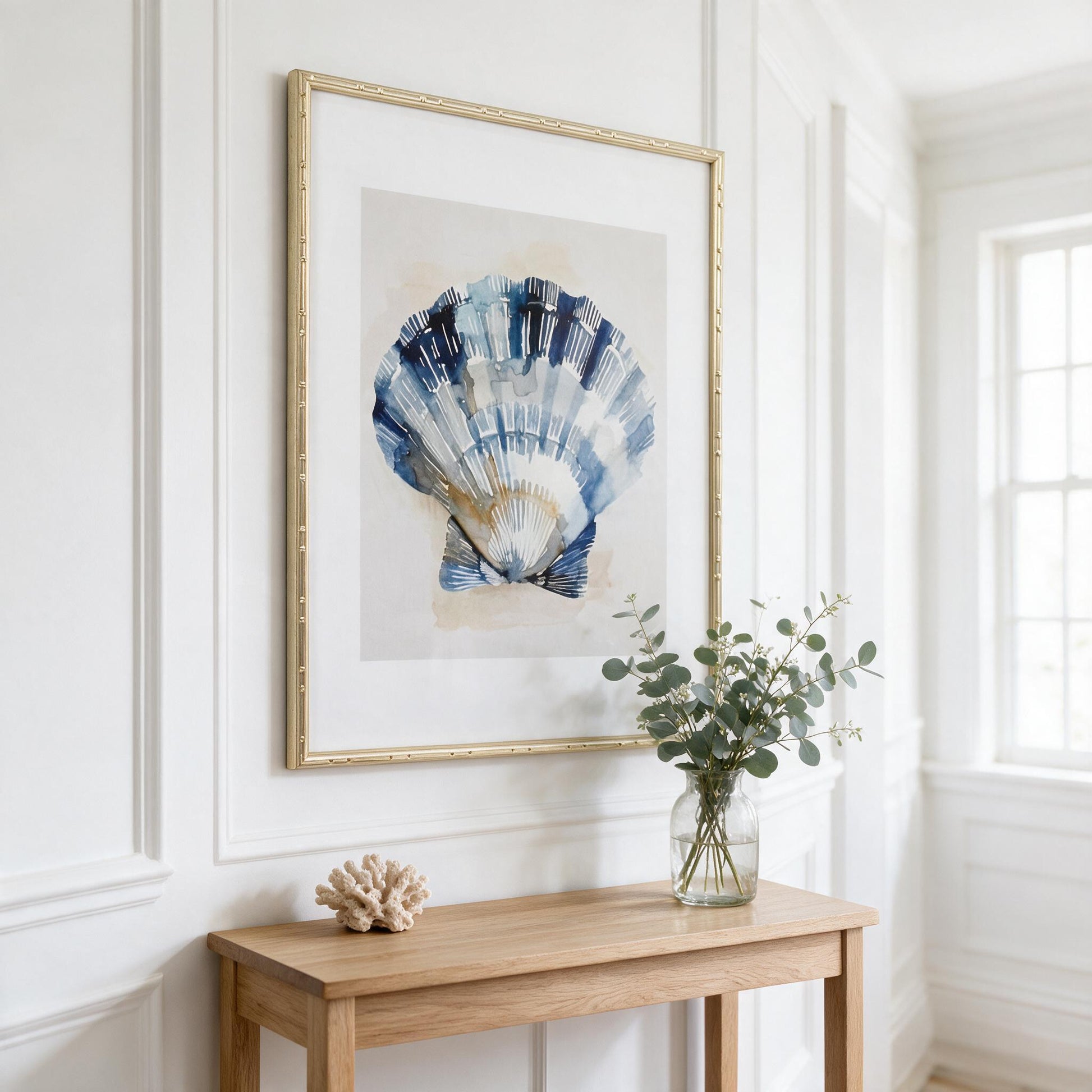 Lumara Navy Shell Framed Print II hung in a bright coastal Hamptons style hallway