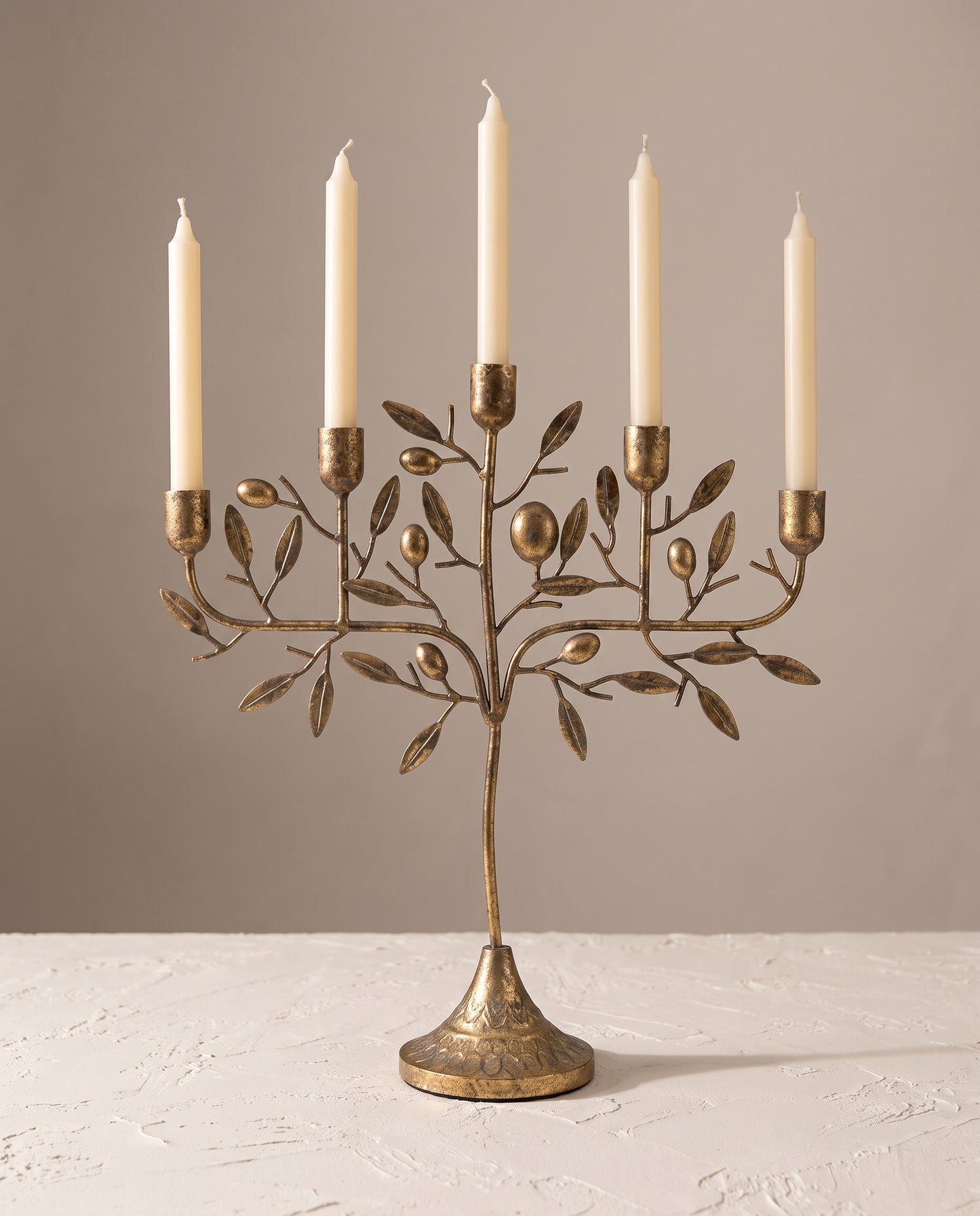 Olive Mediterranean Candelabra with cream taper candles — Lumara Home
