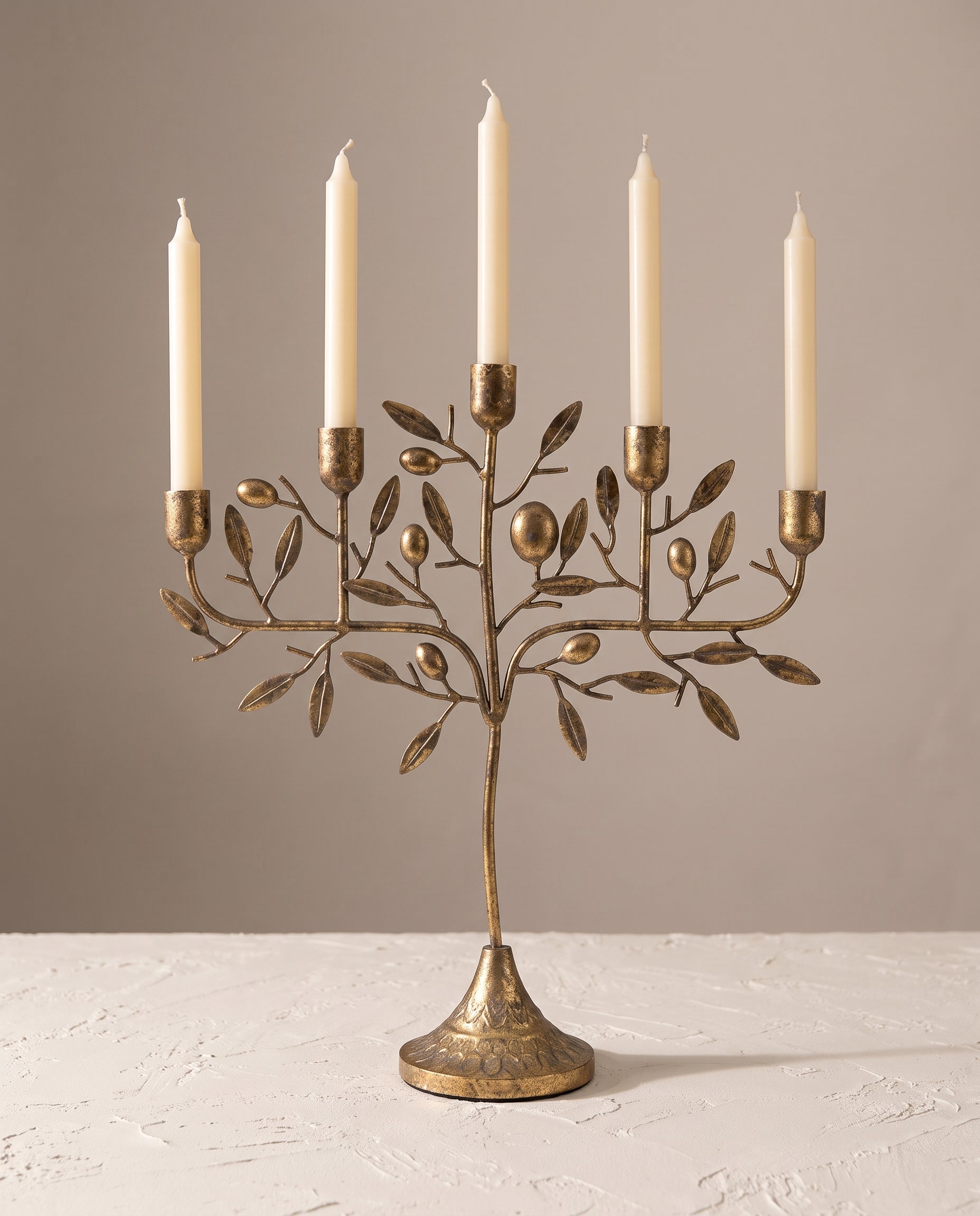 Olive Mediterranean Candelabra with cream taper candles — Lumara Home