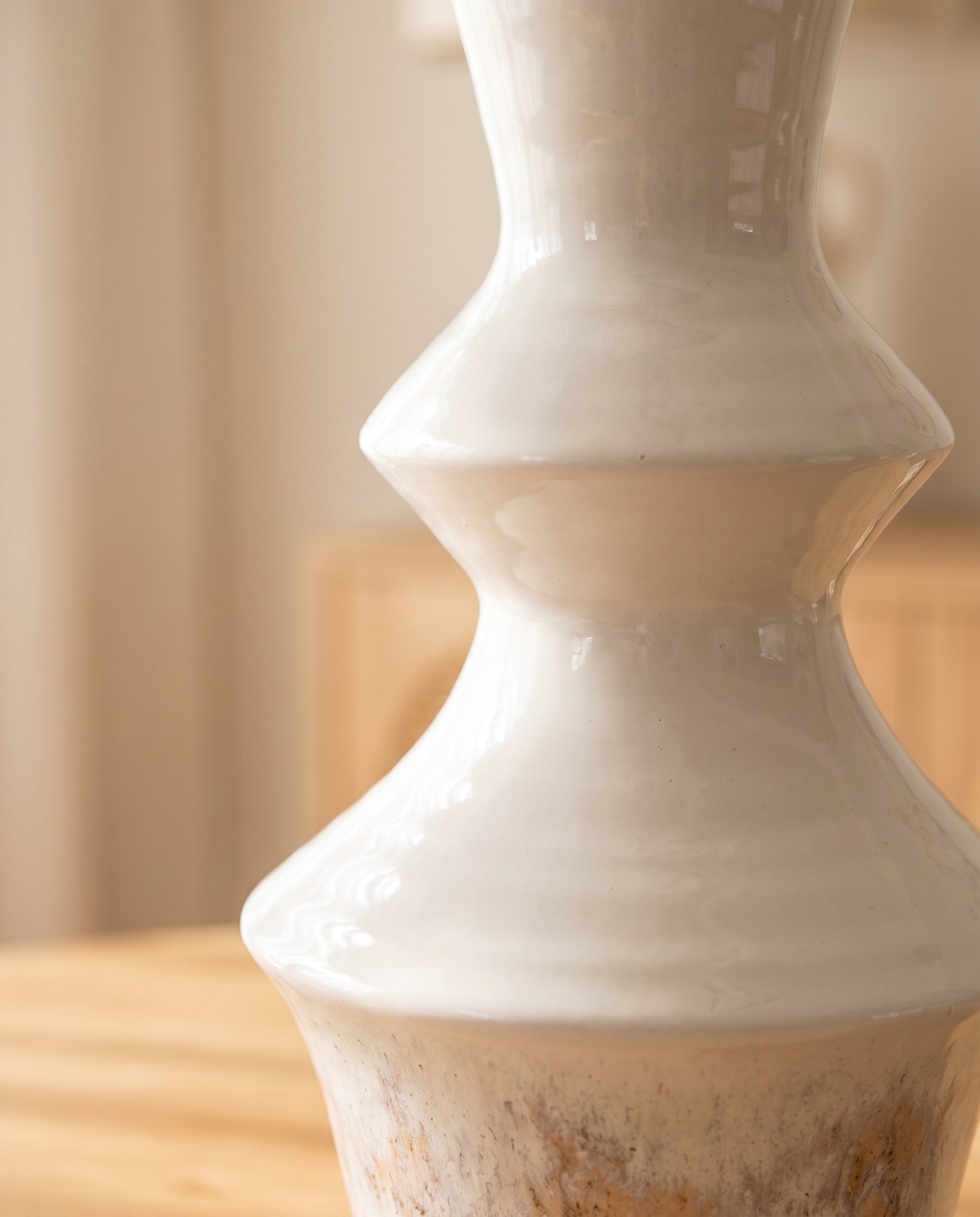 Close-up of the stacked turned ridges and rustic white glaze of the Lumara Mediterranean Statement Vase