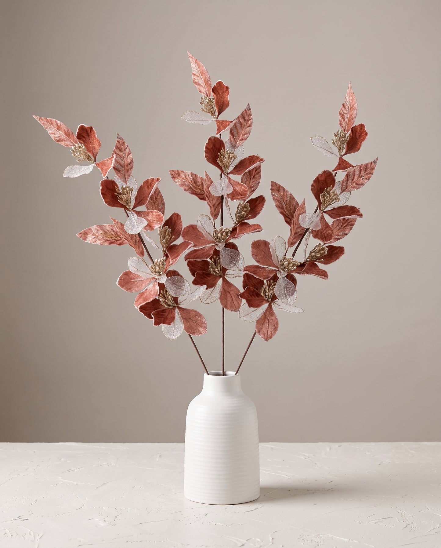 Velvet Leaf Stems in dawn blush styled in ceramic vase — Lumara Home