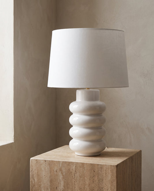 Lumara White Foam Table Lamp — studio hero on travertine — Lumara Home